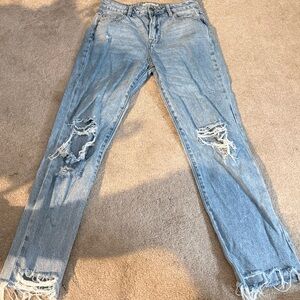 Women's Distressed Light Blue Jeans